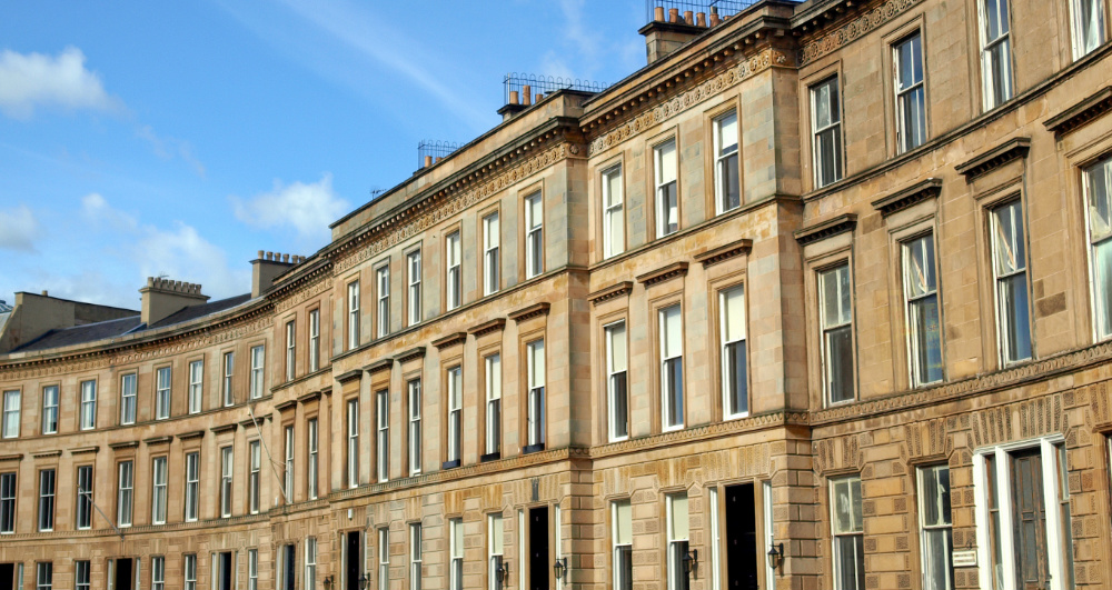 AREA PAGE A row of terraced houses in Glasgow West End Scotland shutterstock_107195033