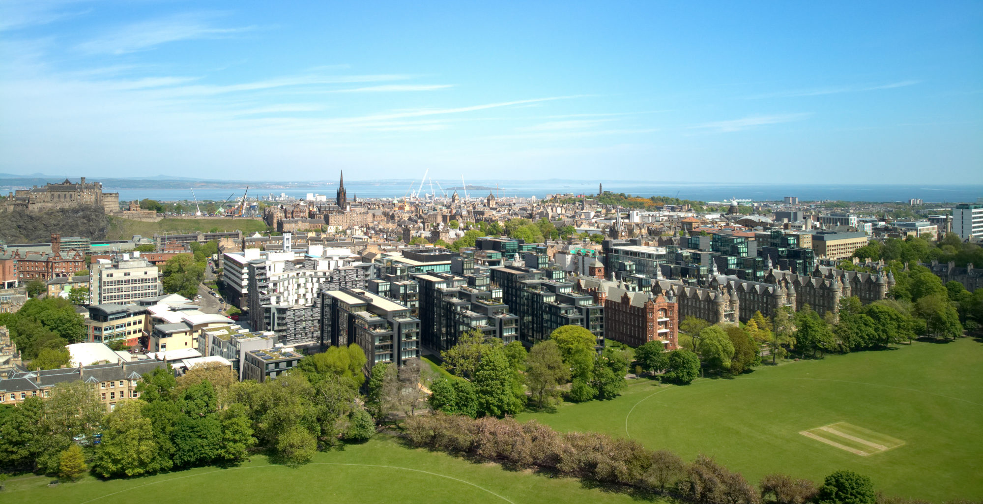 HEADER Aerial drone sunrise view of suburban houses and flats in Edinburgh Scotland shutterstock_1103201882