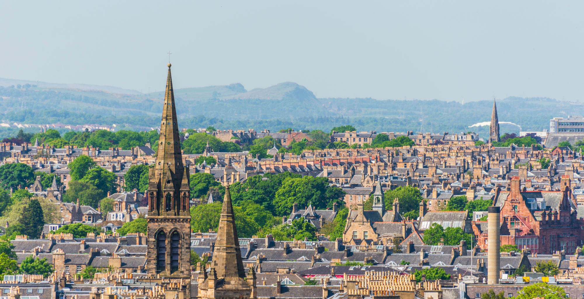 HEADER IMAGE views of Edinburgh city from Arthur’s seat shutterstock_1146986900